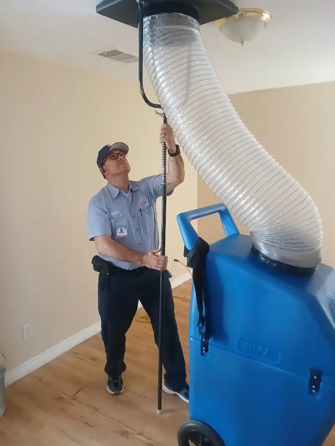 Mini Split Installation technician using HEPA equipment in Clarkston Heights-Vineland